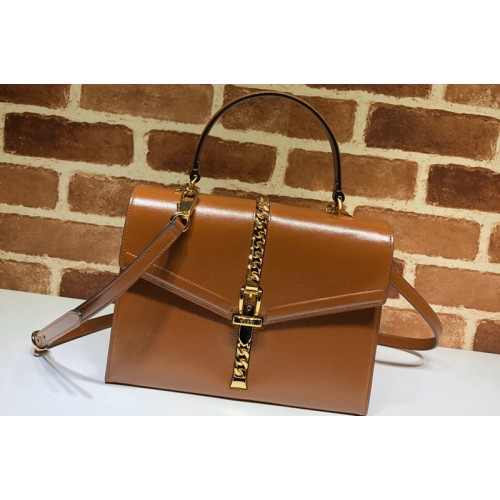 Gucci Sylvie 1969 small top handle bag in Brown textured leather Gucci Sylvie 1969 small top handle bag in Brown textured leather