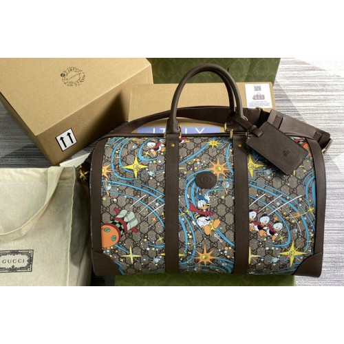 Gucci Disney x Gucci Donald Duck duffle bag in Beige and ebony Supreme canvas with Donald Duck print Gucci Disney x Gucci Donald Duck duffle bag in Beige and ebony Supreme canvas with Donald Duck print