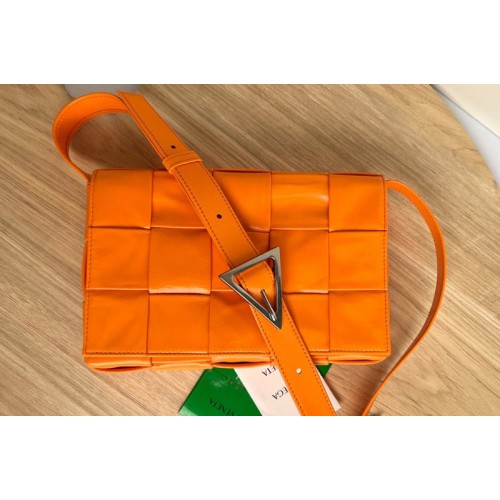 Bottega Veneta Cassette cross-body bag in Orange Intreccio leather Bottega Veneta Cassette cross-body bag in Orange Intreccio leather