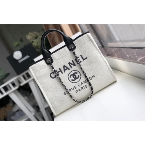 Chanel A66941 Shopping Bag Beige Mixed Fibers With Black Print and Calfskin Chanel A66941 Shopping Bag Beige Mixed Fibers With Black Print and Calfskin